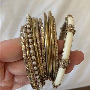 Mix and match gold bangle assortment